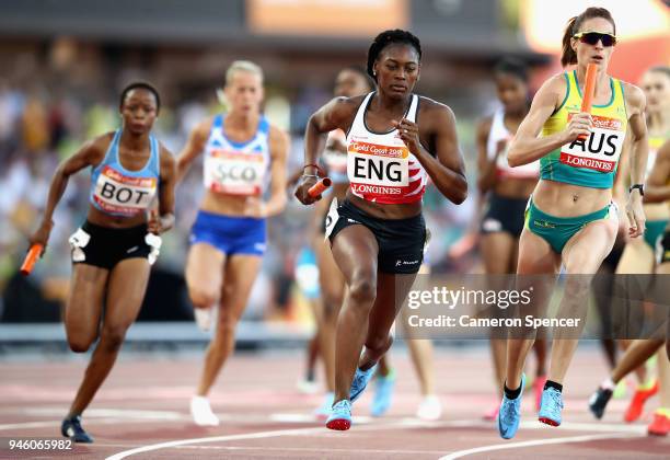 Lauren Wells of Australia and Perri Shakes-Drayton of England compete in the Women's 4x400 metres relay final during athletics on day 10 of the Gold...