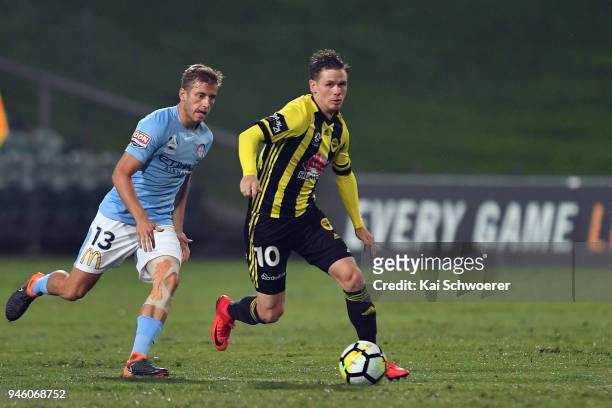 Michael McGlinchey of the Phoenix controls the ball from Stefan Mauk of Melbourne City during the round 27 A-League match between the Wellington...