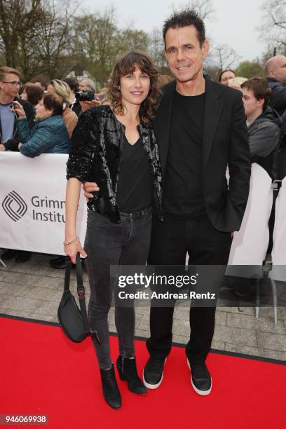 Tom Tykwer and Marie Steinmann arrive at the 54th Grimme Award on April 13, 2018 in Marl, Germany.