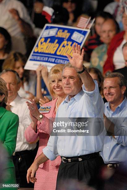 Republican congressional candidate Shelley Sekula-Gibbs, left, is joined by U.S.President George W. Bush, right, during a get-out-the-vote rally on...
