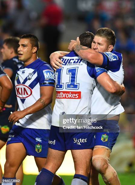 Josh Jackson of the Bulldogs and Greg Eastwood of the Bulldogs celebrate the try of Raymond Faitala-Mariner of the Bulldogs during the round six NRL...