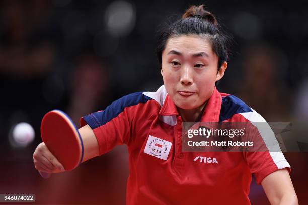 Tianwei Feng of Singapore competes against Mo Zhang of Canada during the Women's Singles Bronze Medal Table Tennis on day 10 of the Gold Coast 2018...