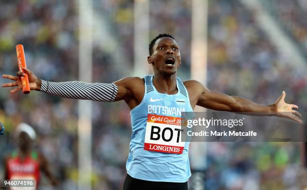 Isaac Makwala of Botswana celebrates as he crosses the line to win gold in the Men's 4x400 metres relay final during athletics on day 10 of the Gold...