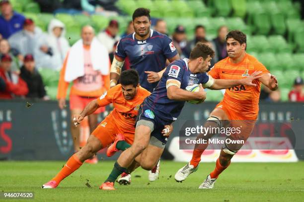 Tom English of the Rebals is tackled during the round nine Super Rugby match between the Rebels and the Jaguares at AAMI Park on April 14, 2018 in...