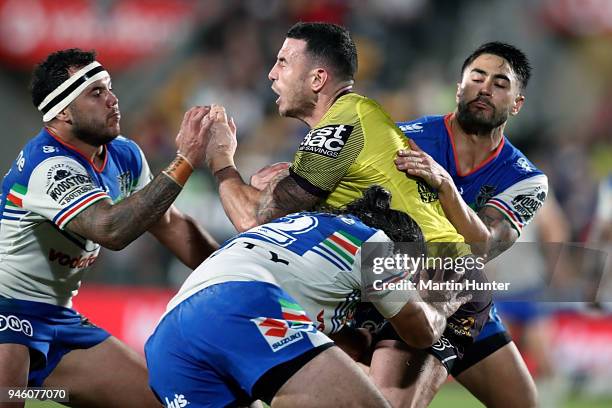 Darius Boyd of the Broncos is tackled during the round six NRL match between the New Zealand Warriors and the Brisbane Broncos at Mt Smart Stadium on...