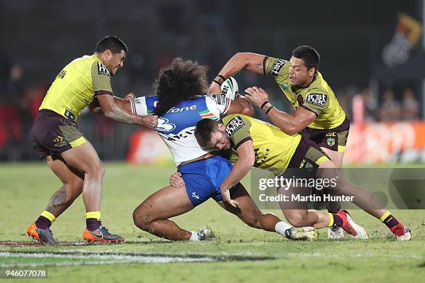 Tohu Harris of the Warriors is tackled during the round six NRL match between the New Zealand Warriors and the Brisbane Broncos at Mt Smart Stadium...