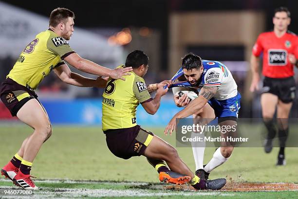 Shaun Johnson of the Warriors looks to take on the defence during the round six NRL match between the New Zealand Warriors and the Brisbane Broncos...