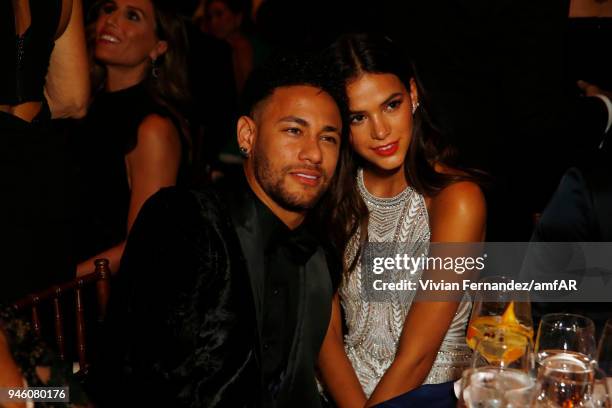 Neymar Junior and Bruna Marquezine attend the 2018 amfAR gala Sao Paulo at the home of Dinho Diniz on April 13, 2018 in Sao Paulo, Brazil.