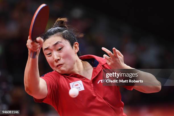 Tianwei Feng of Singapore competes against Mo Zhang of Canada during the Women's Singles Bronze Medal Table Tennis on day 10 of the Gold Coast 2018...