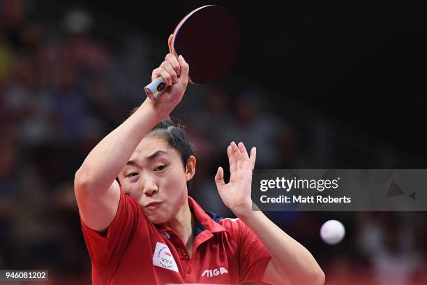 Tianwei Feng of Singapore competes against Mo Zhang of Canada during the Women's Singles Bronze Medal Table Tennis on day 10 of the Gold Coast 2018...