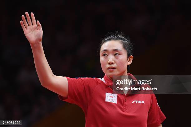 Tianwei Feng of Singapore celebrates after defeating Mo Zhang of Canada during the Women's Singles Bronze Medal Table Tennis on day 10 of the Gold...