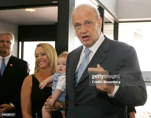 Republican Fred Thompson addresses the media and supporters after arriving at the Mercury Air hangar at Nashville International Airport with is wife...