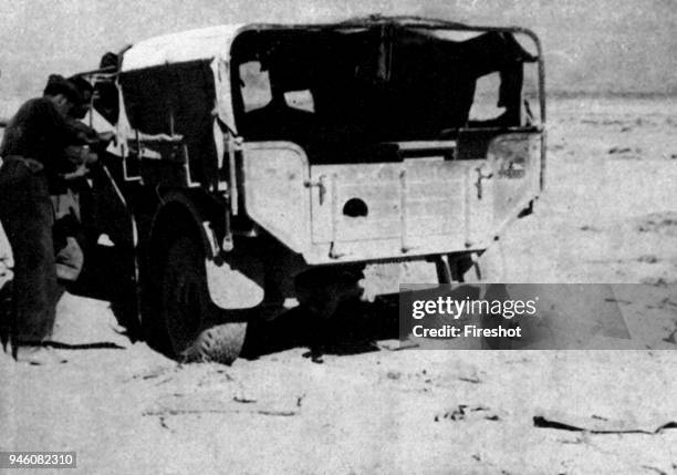 Second World War North African Campaign italian motorized patrol in the libyan desert.