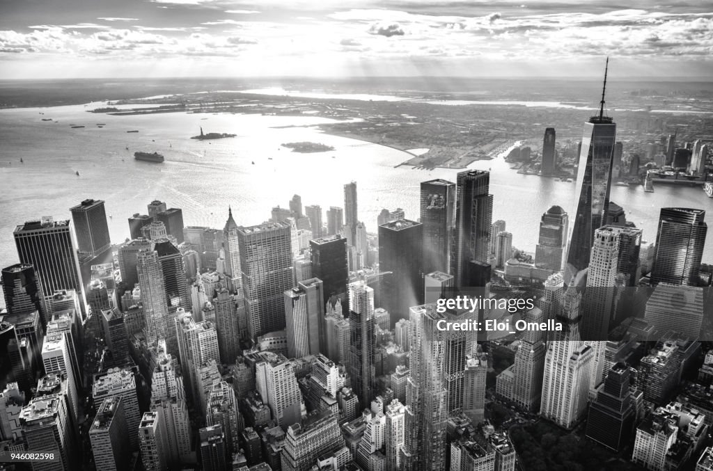 Helicopter view of downtown manhattan island, New York, at sunset