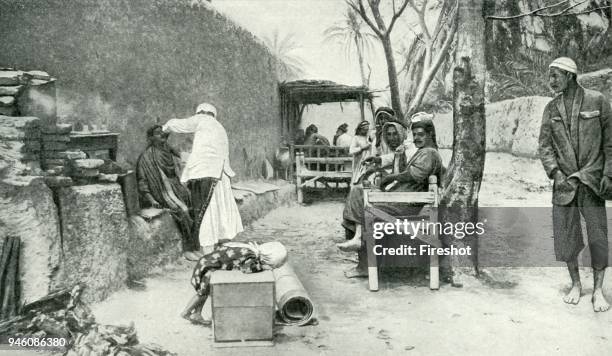 Historical Geography. 1900. Irak. Here are no glass shelves laden with bottles of many-coloured unguents. Even the barber's chair is absent, and a...