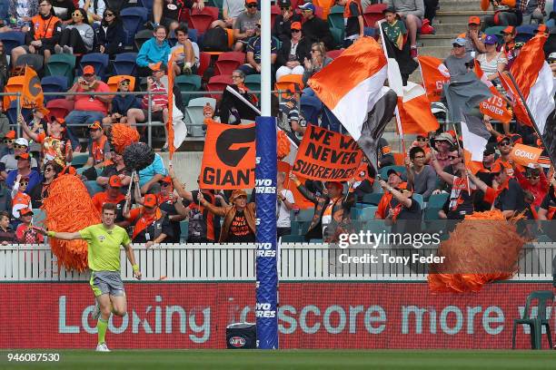 Giants supprters celebrate a goal during the round four AFL match between the Greater Western Sydney Giants and the Fremantle Dockers at UNSW...