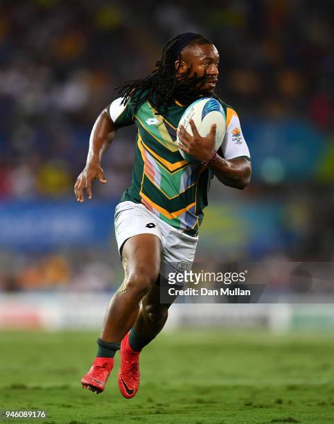 Branco du Preez of South Africa makes a break during the Rugby Sevens Men's Pool A match between South Africa and Papua New Guinea on day 10 of the...