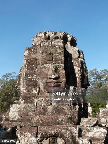 Asia Archaeology-Cambodia. The ruins of Angkor Siem Reap city. Face towers of the Bayon temple represent the king as the Bodhisattva Lokesvara.