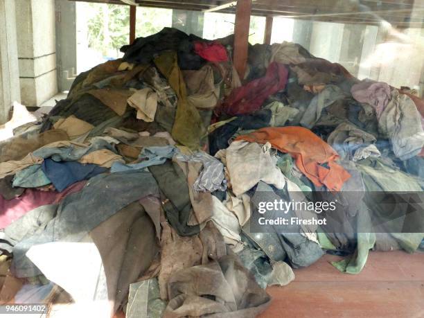 Killing Field-Cambodian genocide. Clothes of the victims at the Killing Field of Choeung Ek. The Killing Fields are a number of sites in Cambodia...