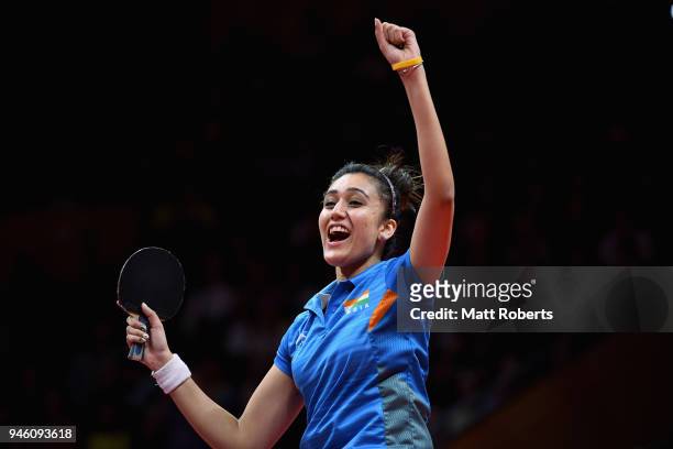 Manika Batra of IndiaÊcelebrates defeating Mengyu Yu of Singapore during the Women's Singles Gold Medal Table Tennis match on day 10 of the Gold...