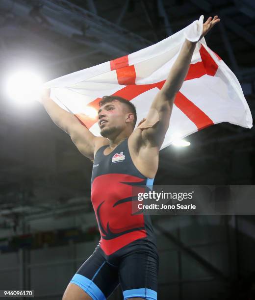 Syerus Eslami of England celebrates after winning bronze in the men's freestyle 86kg event during Wrestling on day 10 of the Gold Coast 2018...