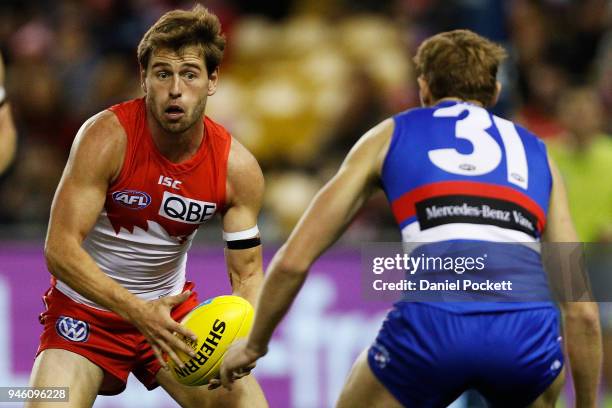 Nick Smith of the Swans runs with the ball during the round four AFL match between the Western Bulldogs and the Sydney Swans at Etihad Stadium on...