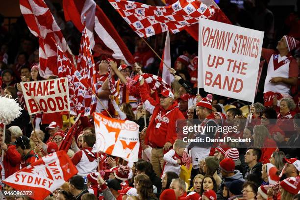 Swans fans cheer during the round four AFL match between the Western Bulldogs and the Sydney Swans at Etihad Stadium on April 14, 2018 in Melbourne,...