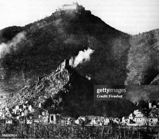 Second World War-Italy 1944. Air raid at Monte Cassino in February 1944. The Monte Cassino Abbey atop Monastery Hill February 15 1944 during and...