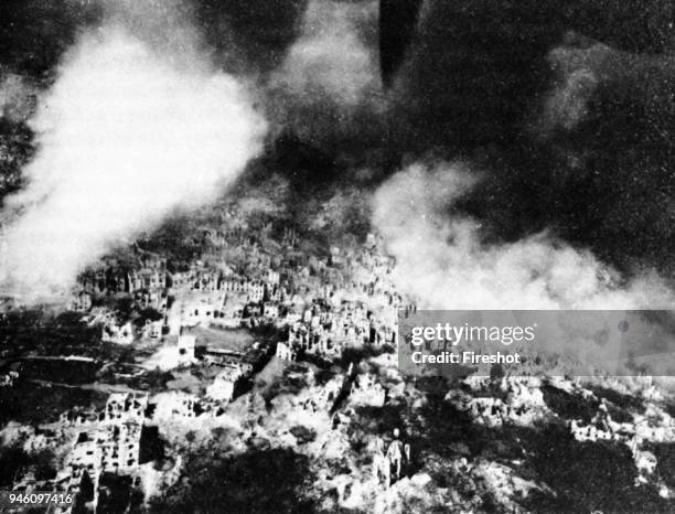 Second World War-Italy 1944. Air raid at Monte Cassino in February 1944. The Monte Cassino Abbey atop Monastery Hill February 15 1944 during bombing...