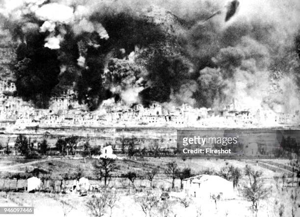 Second World War-Italy 1944. Air raid at Monte Cassino in February 1944. The Monte Cassino Abbey atop Monastery Hill February 15 1944 during bombing...