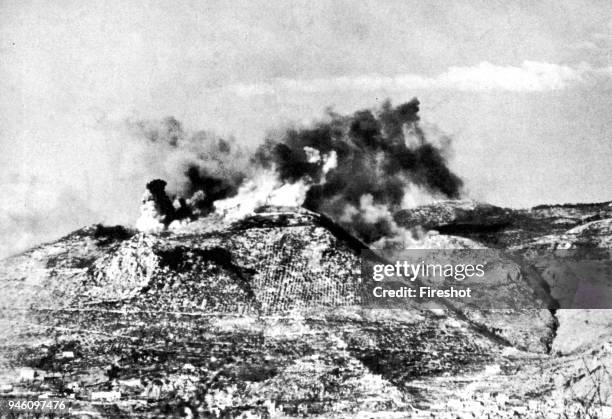 Second World War-Italy 1944. Air raid at Monte Cassino in February 1944. The Monte Cassino Abbey atop Monastery Hill February 15 1944 during and...