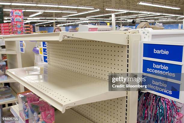 An aisle sign for Barbie toys sits next to an empty shelf at an Exton, Pennsylvania, Toys "R" Us store on Wednesday, September 5, 2007. Mattel Inc.,...