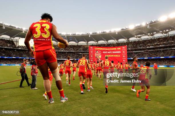 Aaron Hall of the Suns runs out during the round four AFL match between the West Coast Eagles and the Gold Coast Suns at Optus Stadium on April 14,...