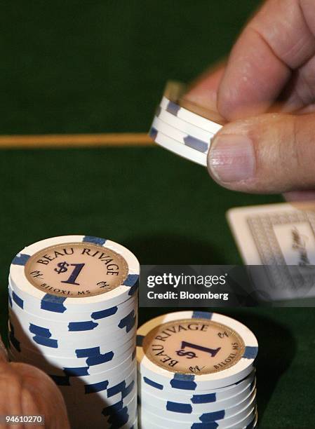 Beau Rivage dollar chips are stacked during game play inside the Beau Rivage Resort & Casino in Biloxi, Mississippi after its re-opening, Tuesday,...