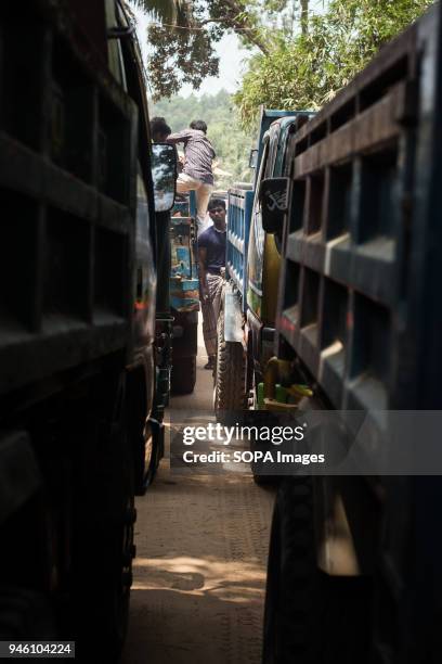 The view between the traffic on the main road through Kutupalong refugee camp. There are now approximately 600,000 Rohingya refugees in the...