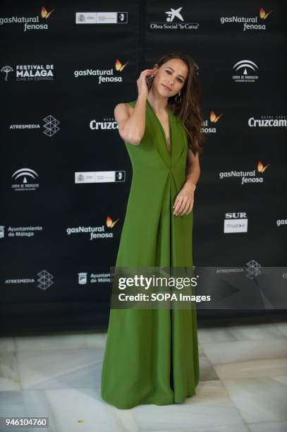 Spanish actress Irene Escolar poses on the photocall inside of the Cervantes Theatre during the opening of the 21th International Malaga Film...