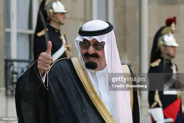 Saudi Arabian King Abdullah gives a thumbs up at the Elysee Palace in Paris, France, Thursday June 21, 2007. French President Nicolas Sarkozy and...