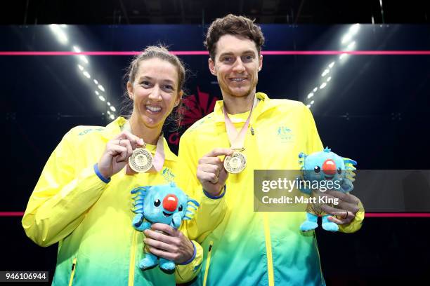 Gold Medallists Donna Urquhart and Cameron Pilley of Australia pose after winning the Mixed Doubles Gold Medal Match between Dipika Pallikal Karthik...