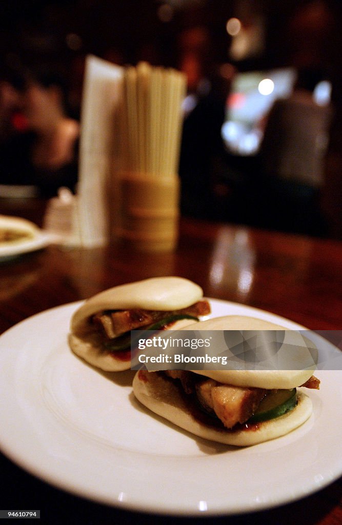 Steamed buns with pork belly, hoisin, cucumber and scallion