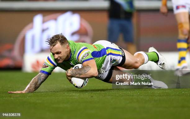 Blake Austin of the Raiders scores during the round six NRL match between the Canberra Raiders and the Parramatta Eels at GIO Stadium on April 14,...