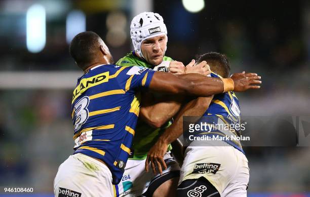 Jarrod Croker of the Raiders is tackled during the round six NRL match between the Canberra Raiders and the Parramatta Eels at GIO Stadium on April...