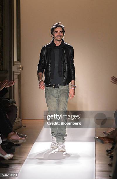 French fashion designer Christophe Decarnin for Balmain salutes the audience at the end of the presentation of his Spring/Summer 2008 ready-to-wear...