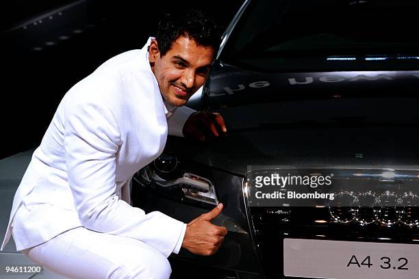 Bollywood actor John Abraham poses with the new Audi A4 at Auto Expo 2008 in New Delhi, India, on Thursday, Jan. 10, 2008. Almost seven motorcycles...