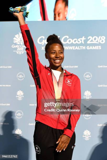 Gold medalist Jennifer Abel of Canada poses during the medal ceremony for the Women's 3m Springboard Diving Final on day 10 of the Gold Coast 2018...