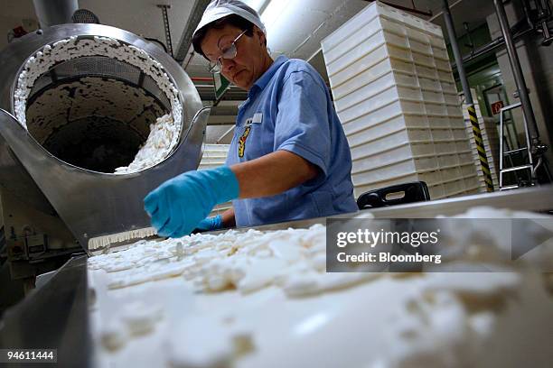 Haribo employee Nada Mikic runs the machine that makes Knuddel-Knut'sch gummi candy, shaped like Knut, the baby polar bear abandoned by its mother...