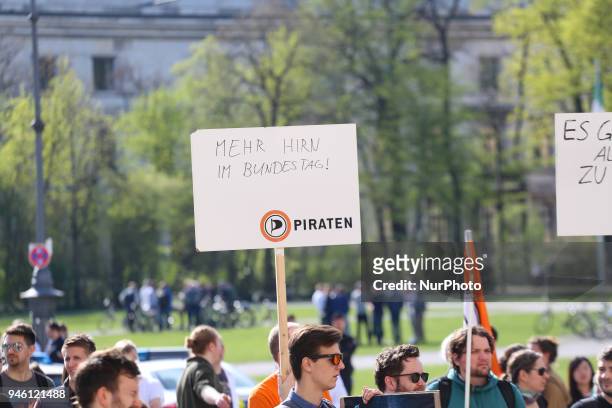 Sign asking for more brain in the Bundestag . Some hundreds of people joined the March for Science in Munich, Germany, on 14 April 2018. Among them...