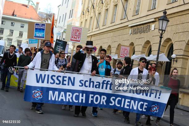 Front banner. Some hundreds of people joined the March for Science in Munich, Germany, on 14 April 2018. Among them there was the Pirate party, the...