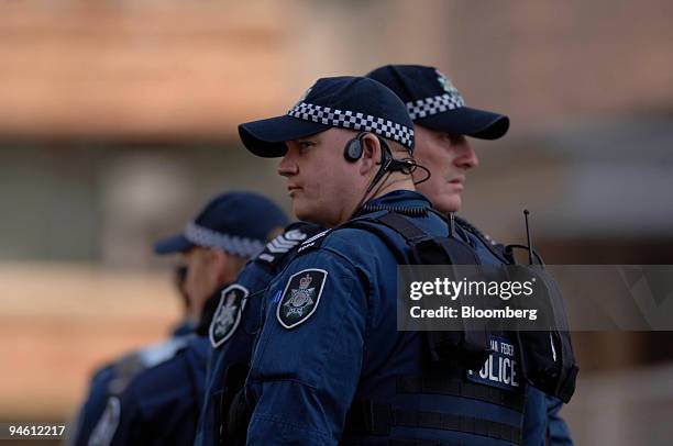 Australian police monitor activity on day four of the Asia-Pacific Economic Cooperation meeting in Sydney, Australia, on Wednesday, Sept. 5, 2007. A...