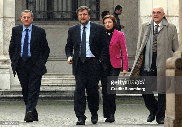 Jean Cyril Spinetta, chief executive officer of Air France-KLM, far left, arrives with Francesco Mengozzi, former Alitalia chief executive officer,...