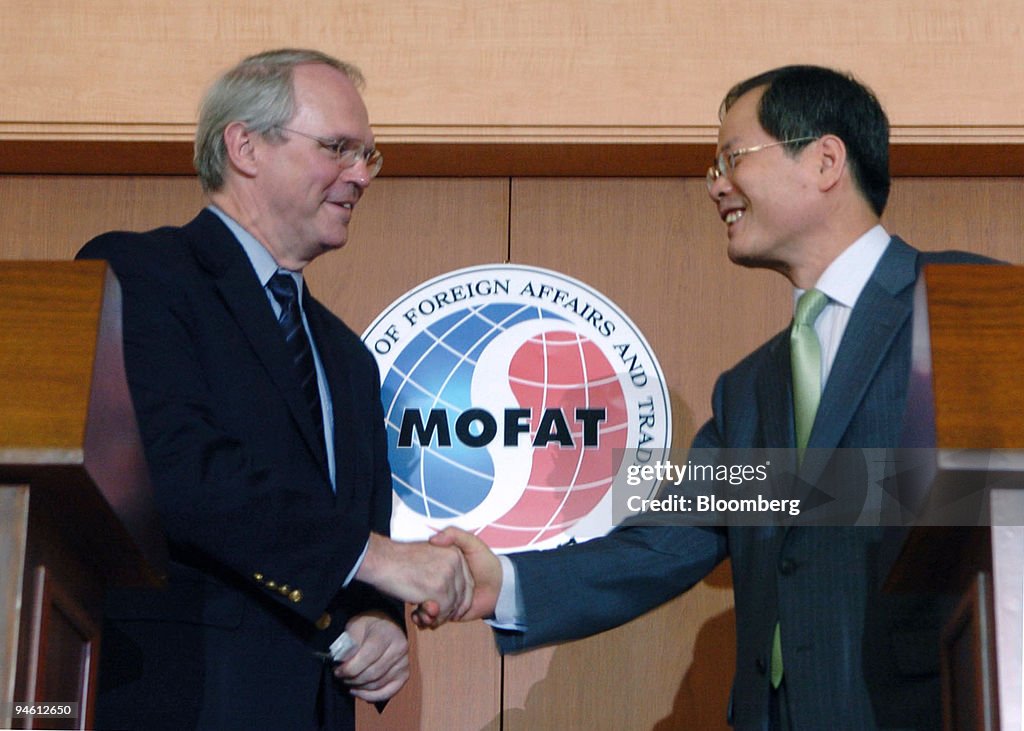 Christopher Hill, U.S. assistant secretary of state, left, s